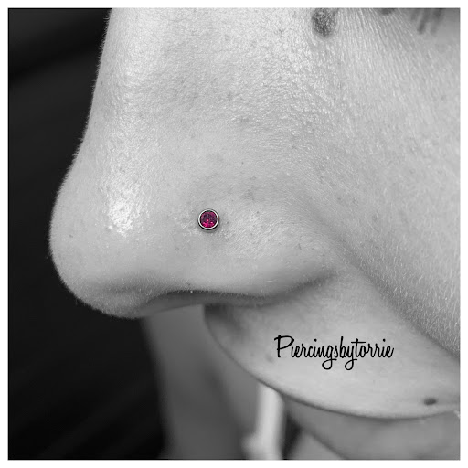 Explore ideas for small tattoos for guys, creative tattoo ideas in Fort Walton Beach, available at Piercings by Torrie
