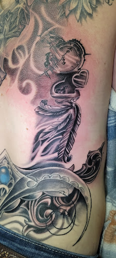 Explore ideas for tattoo sleeves, creative tattoo ideas in Angola, available at Hoodlum Ink