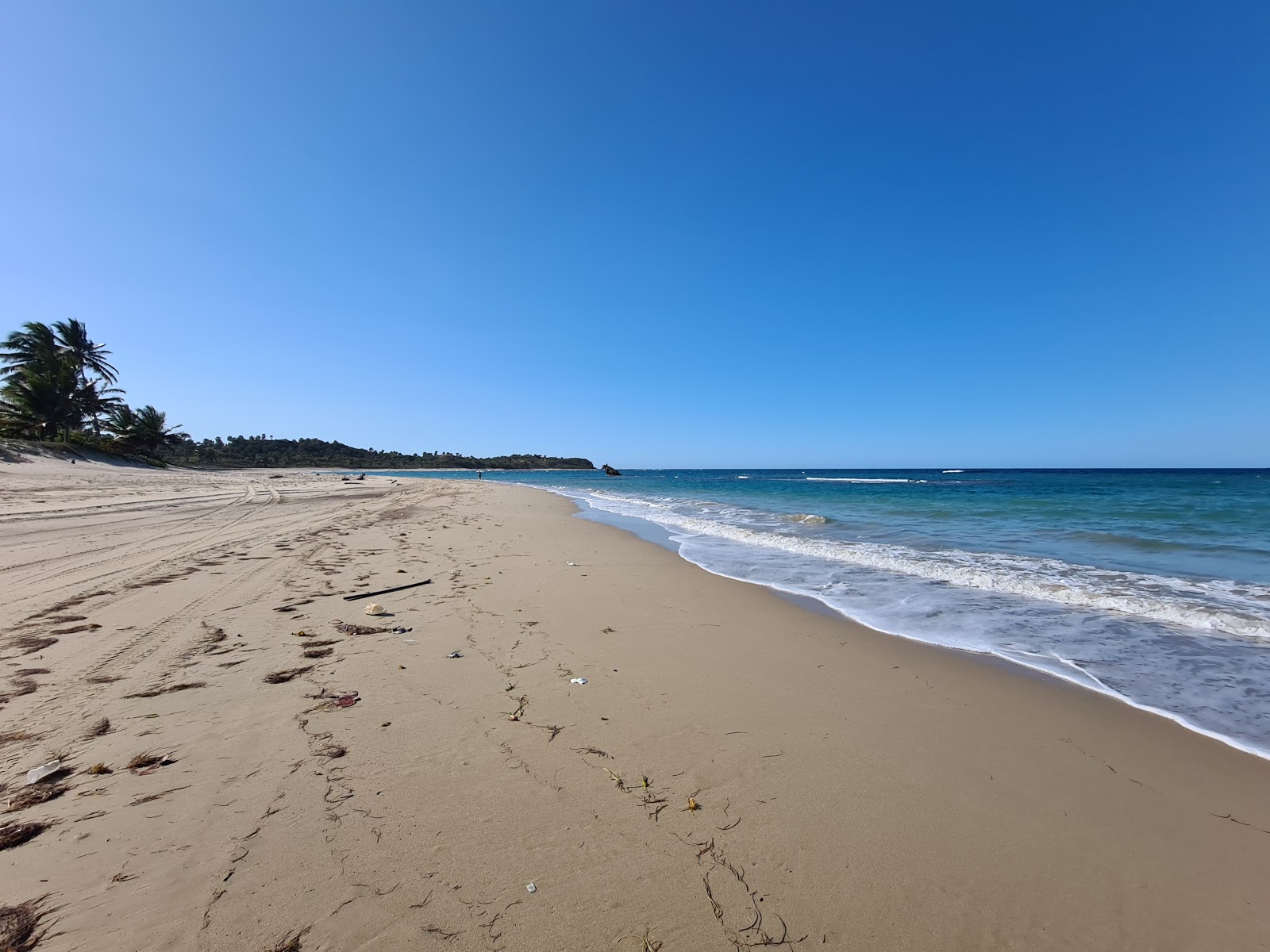 Fotografija Playa Las Ojaldras z svetel pesek površino