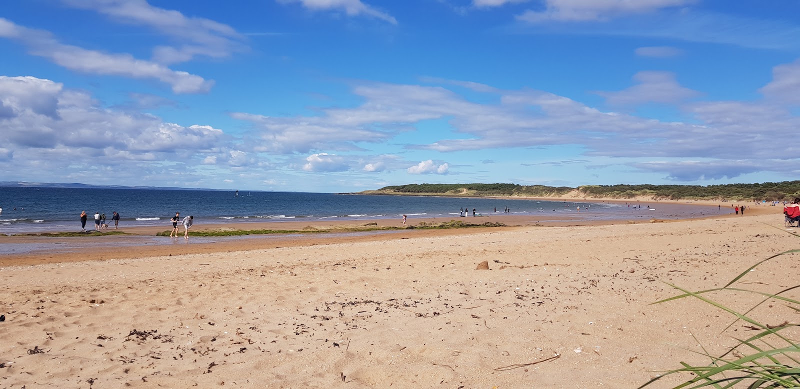 Photo of Gullane beach surrounded by mountains