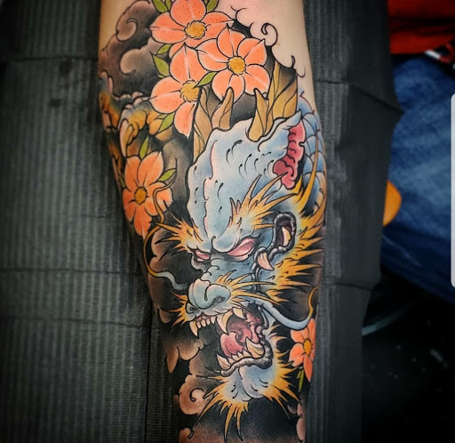 Explore behind the ear tattoo ideas for guys, creative tattoo ideas in Hagerstown, available at Tomahawk Tattoo MD