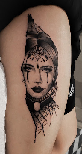 Explore wedding ring tattoo ideas male, creative tattoo ideas in Mount Pleasant, available at Triple 9 Fine Tattoo Art Gallery