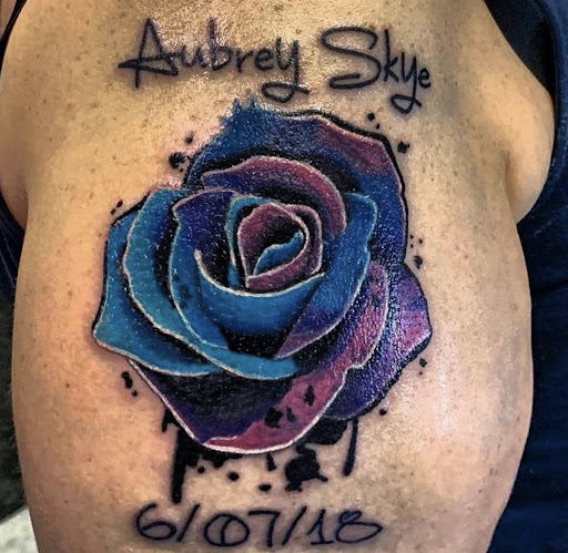 Explore womens neck tattoos ideas, creative tattoo ideas in Hudson Falls, available at ALTERED ADDICTION TATTOOS