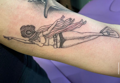 Explore men's tattoo ideas sleeve, creative tattoo ideas in Cincinnati, available at Opal Moon Tattoo