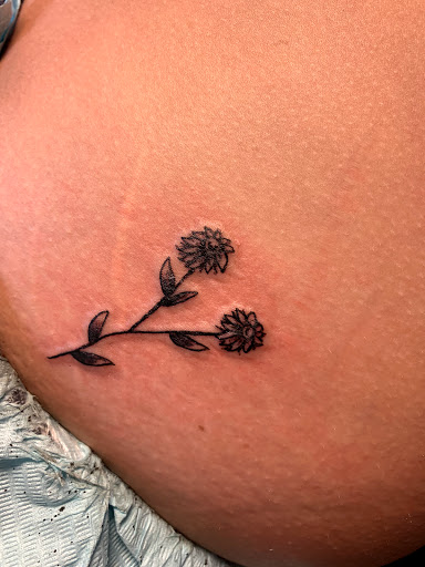 Explore alpha tattoo ideas, creative tattoo ideas in Seymour, available at American Gypsy Tattoo Corp.