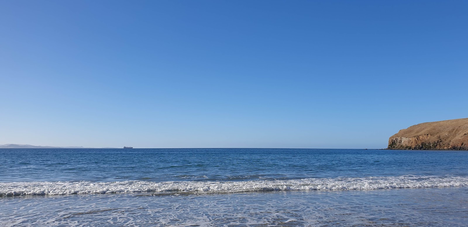 Foto van Whareakeake Beach met turquoise water oppervlakte