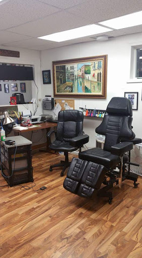 Explore blue flame tattoo ideas, creative tattoo ideas in Fayette, available at Last Stand Tattoo