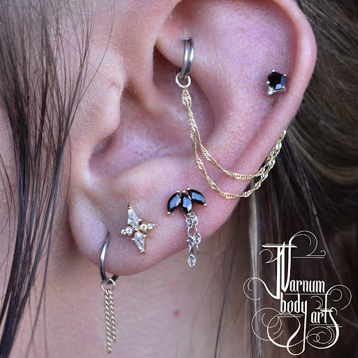 Explore cover up tattoo ideas for upper arm, creative tattoo ideas in Redding, available at J Varnum Body Arts Single Track Tattoo