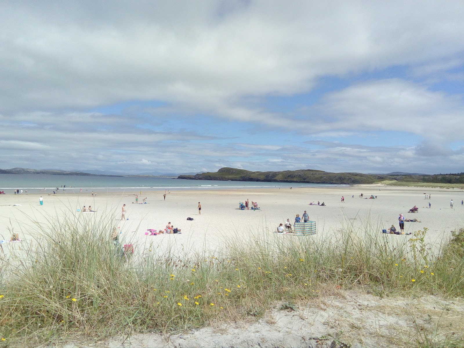 Foto van Marble Hill Beach ondersteund door kliffen
