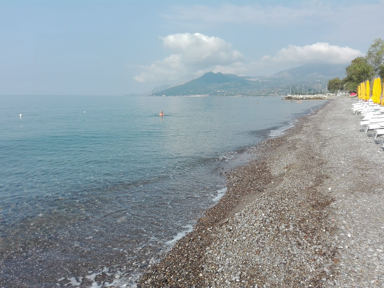 Photo of Capitello beach II with black sand & pebble surface