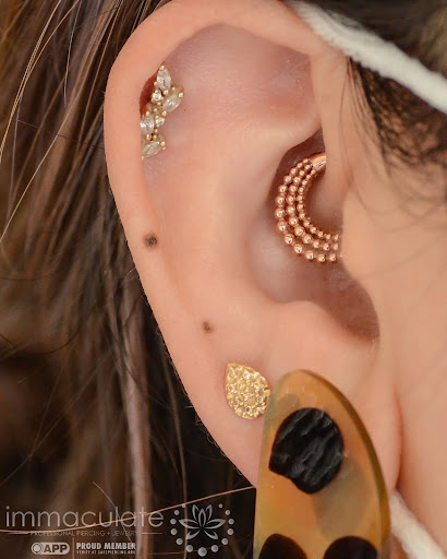 Explore wildflower tattoo ideas, creative tattoo ideas in Columbia, available at Immaculate Body Piercing