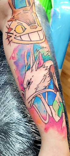 Explore tattoo ideas for womens thigh, creative tattoo ideas in Benton, available at Spectrum Tattoo