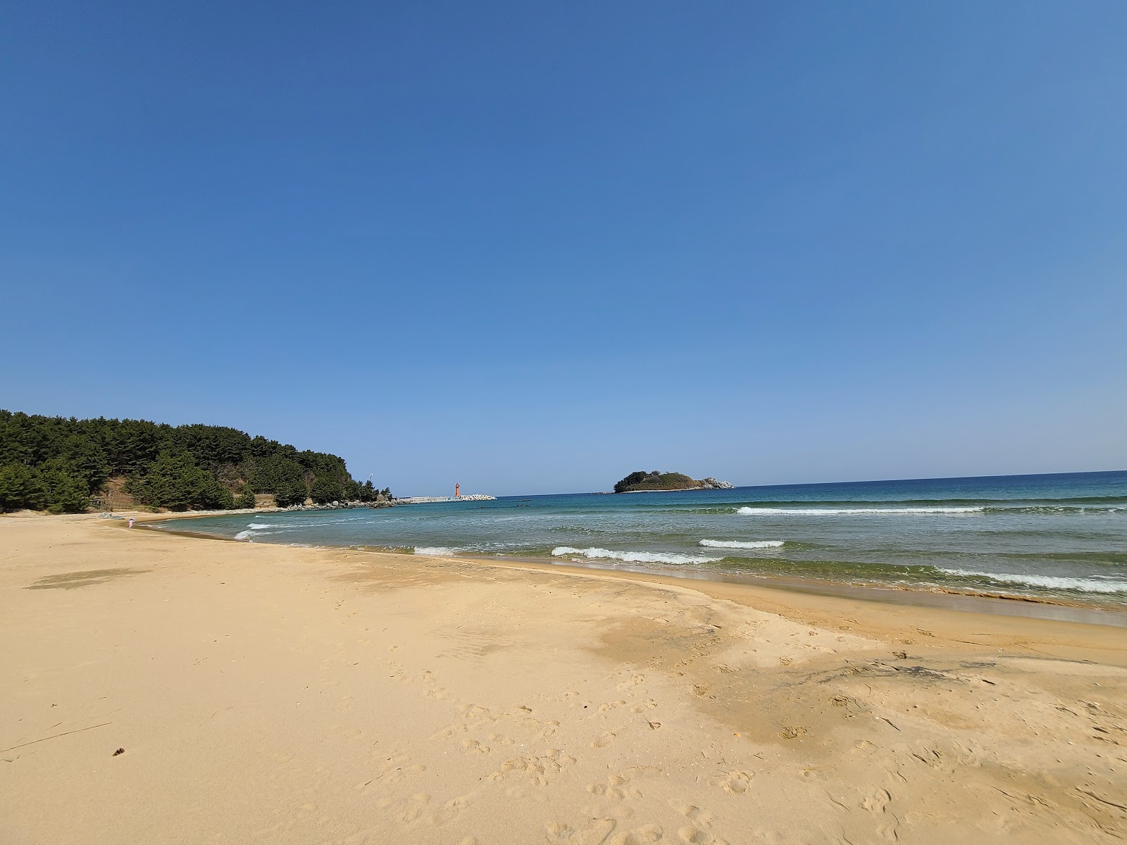 Foto von Hwajinpo Beach - beliebter Ort unter Entspannungskennern