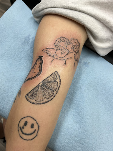 Explore woman arm tattoo ideas, creative tattoo ideas in Leola, available at Sweet Omens