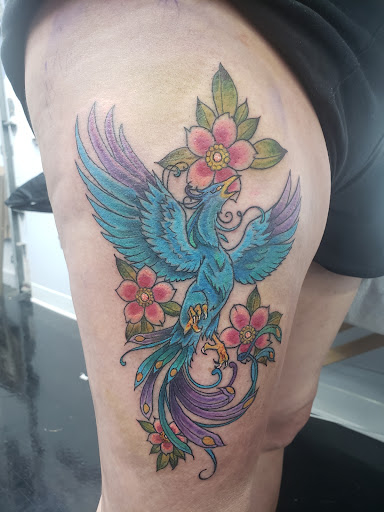 Explore tattoo ideas on the shoulder, creative tattoo ideas in Erie, available at Code of Honor Tattoo