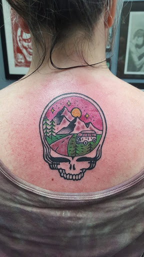 Explore slash tattoo ideas, creative tattoo ideas in Cincinnati, available at Tattoo Makers