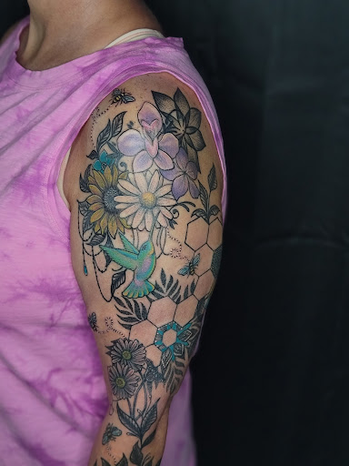 Explore muscle tattoo ideas, creative tattoo ideas in Hillsboro, available at Reflections Art Gallery and Studio