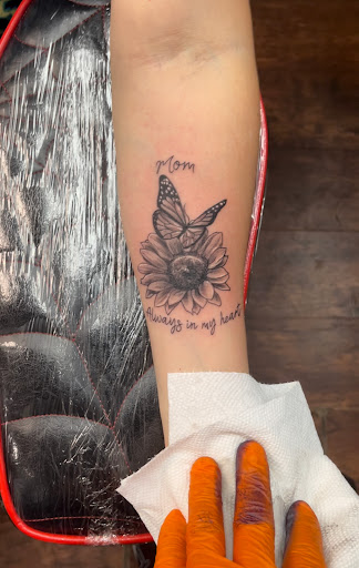 Explore spina bifida tattoo ideas, creative tattoo ideas in Somerset, available at Benny binnu tattoo