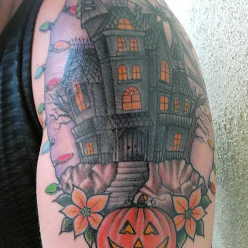 Tattoo Shop «Rise Above Tattoo», reviews and photos, 1009 N Mills Ave, Orlando, FL 32803, USA