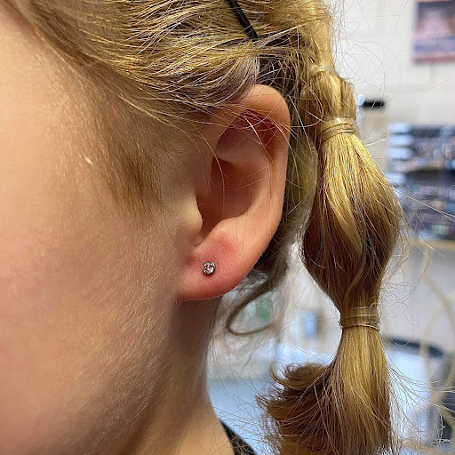 Explore painting tattoo ideas, creative tattoo ideas in Nampa, available at Hippie Hoops and Holes