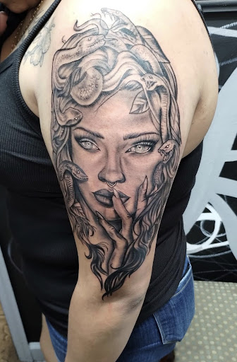 Explore forearm half sleeve cover up tattoo ideas, creative tattoo ideas in Okeechobee, available at Muck City Tattoos & Piercings
