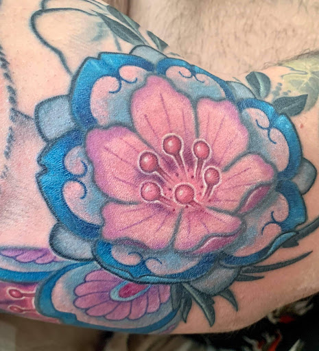 Explore tattoo ideas on the shoulder, creative tattoo ideas in Easthampton, available at The Black Labyrinth Tattoo Syndicate