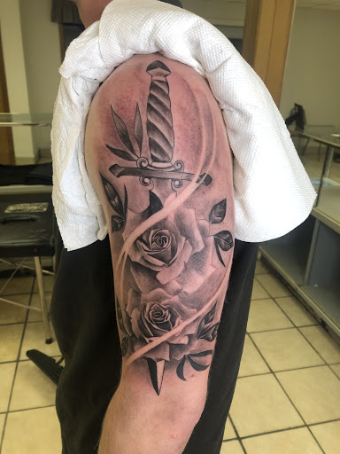 Explore wrist tattoo cover up ideas, creative tattoo ideas in White Cloud, available at Mikeys Ink