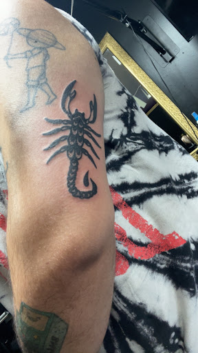 Explore atlantis tattoo ideas, creative tattoo ideas in Titusville, available at Space Coast Ink Tattoo Studio