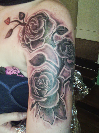 Explore garter tattoo ideas, creative tattoo ideas in Noblesville, available at Mystic Images Tattoo Co.