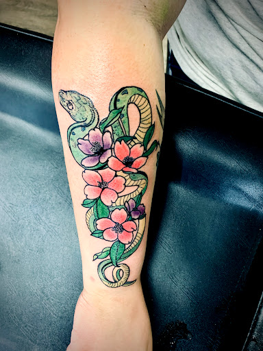 Explore tattoo shop decor ideas, creative tattoo ideas in Lake City, available at Crooked Spines Tattoo Studio