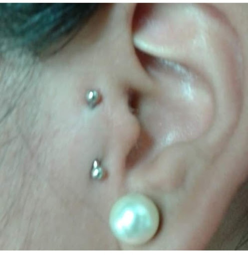 Explore massage therapist tattoo ideas, creative tattoo ideas in Hialeah, available at Allstar Tattoo & Body piercing