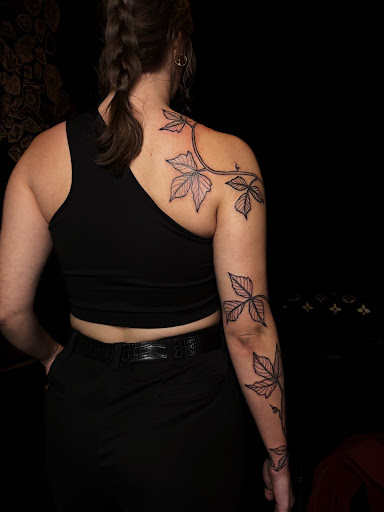 Explore leg tattoo ideas for females, creative tattoo ideas in Ypsilanti, available at Michigan Avenue Tattoo & Piercing