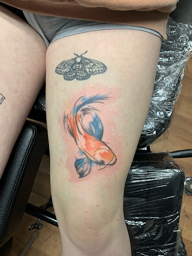 Explore head tattoo ideas for females, creative tattoo ideas in Kirksville, available at Bedford Legacy Tattoo and Body Piercing