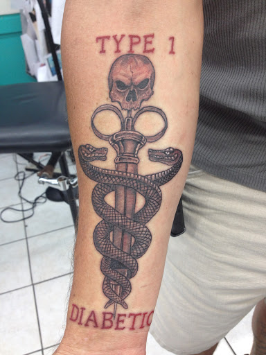 Explore tiny ankle tattoo ideas, creative tattoo ideas in Kenner, available at Electric Expressions