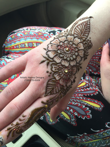 Explore back arm tattoo ideas, creative tattoo ideas in Littleton, available at Artistic Henna Designs