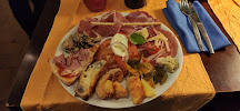 Plats et boissons du Restaurant italien Trattoria La Tavola Di Mamma généreusement italien à Brive-la-Gaillarde - n°11