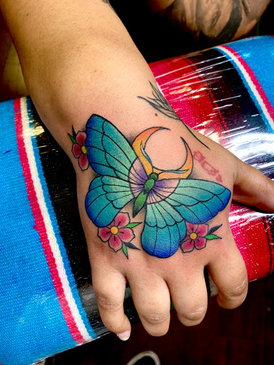 Find feminine skull tattoo ideas for your next unique tattoo in Modesto at Inkwell Tattoo