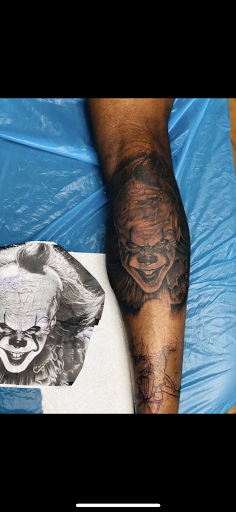 Explore lion and cub tattoo ideas, creative tattoo ideas in Jamaica, available at Rising Phoenix Ink