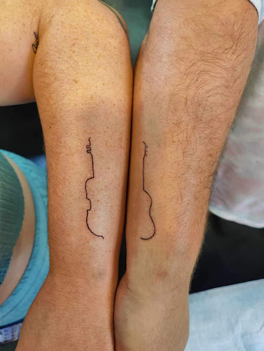 Find unique friendship tattoo ideas for your next unique tattoo in Lewisburg at Rose and Dagger Tattoo