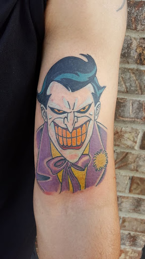 Explore red tattoo ideas, creative tattoo ideas in Columbia, available at Living Canvas Tattoo & Body Piercing