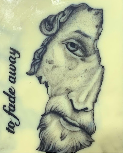 Explore american football tattoo ideas, creative tattoo ideas in Easley, available at Peach Pit Tattoo