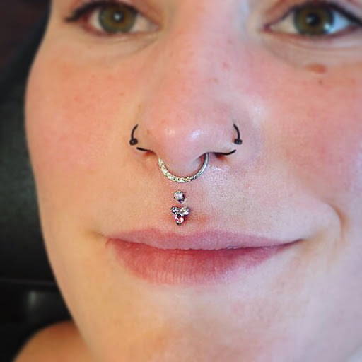 Explore racoon tattoo ideas, creative tattoo ideas in Redding, available at Velvet Orange Bodycraft