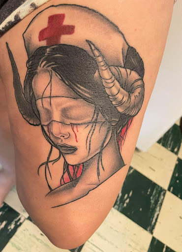 Explore hopeless romantic tattoo ideas, creative tattoo ideas in Terre Haute, available at Marcus Large Tattoo Studio