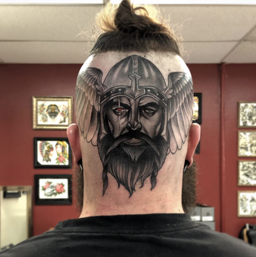 Explore simple men tattoo ideas, creative tattoo ideas in Menomonie, available at Kindhand Tattoo