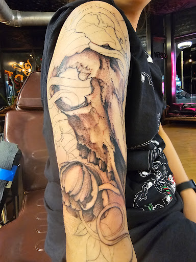 Explore unique breast cancer tattoo ideas, creative tattoo ideas in Chicago, available at Dark Heart Tattoo Chicago