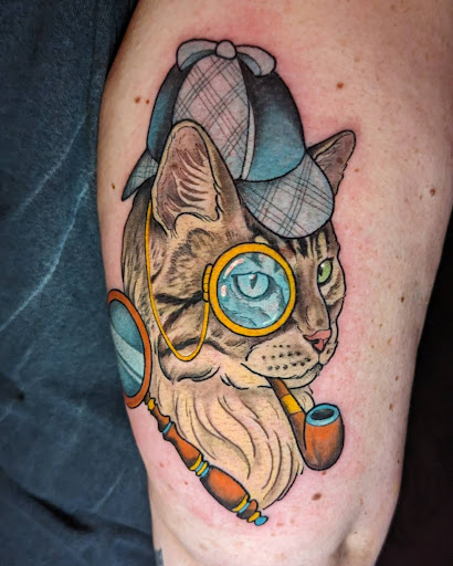 Explore 2003 tattoo ideas, creative tattoo ideas in Omaha, available at Evil Eye Tattoo Studio