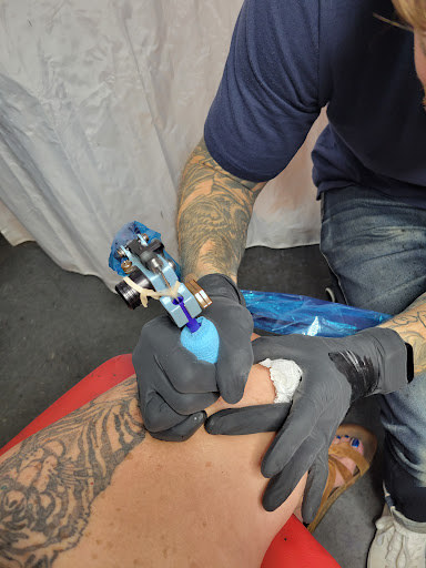Explore lower back tattoo ideas, creative tattoo ideas in Milledgeville, available at Pair-O-Dice
