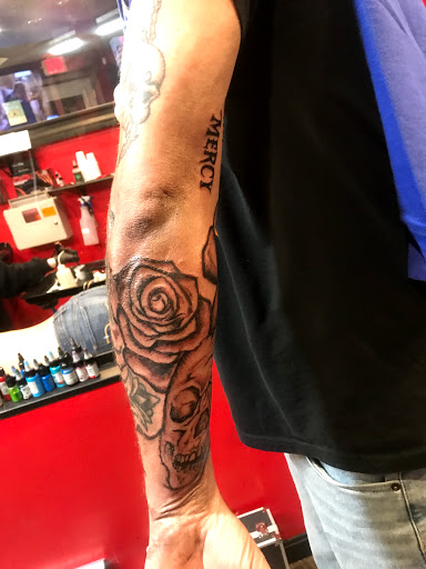 Explore crown tattoo ideas for guys, creative tattoo ideas in Lexington, available at LexInk Tattoo