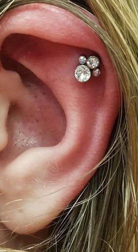 Explore buddhist tattoo ideas, creative tattoo ideas in Chapel Hill, available at Golden Falcon Tattoo and Piercing