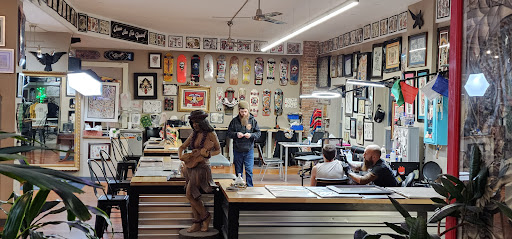 Explore full neck tattoo ideas for men, creative tattoo ideas in Bloomington, available at Illinois Tattoo Co